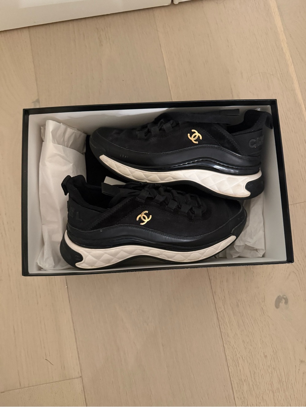 CHANEL Black Sneakers with Gold CC Emblem and White Sole